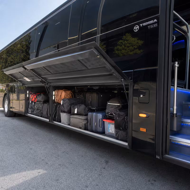 Party bus interior with wraparound leather seating and LED lighting in Glendale